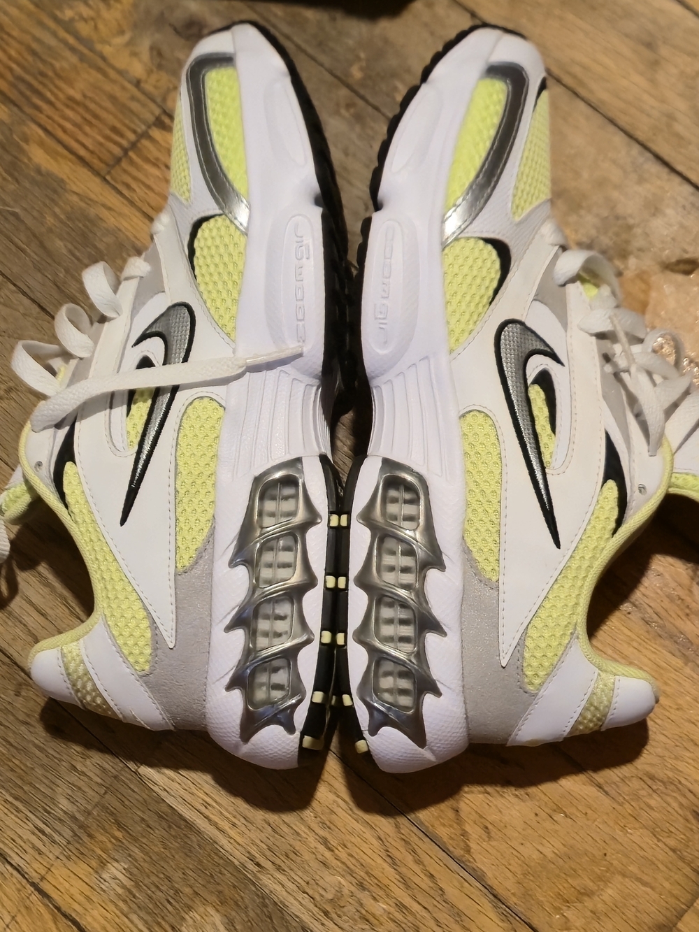 Women's Nike Zoom Air Fire in the white and volt colorway.